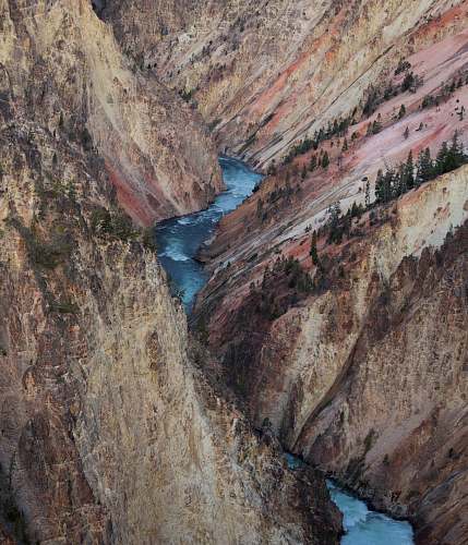 mountain high-angle photography of river in between mountain valley